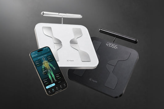 Black and white Hume Pod 2.0 devices with the companion app